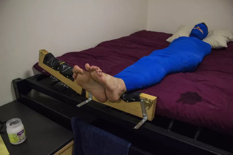 Behind the scenes of a short break before being locked facedown for more tickling! OC