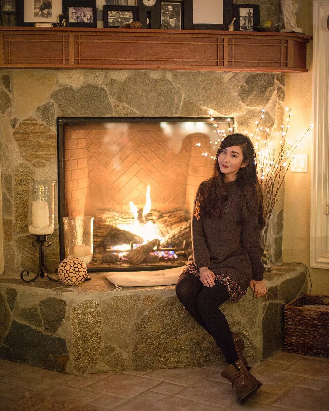 by the fireplace
