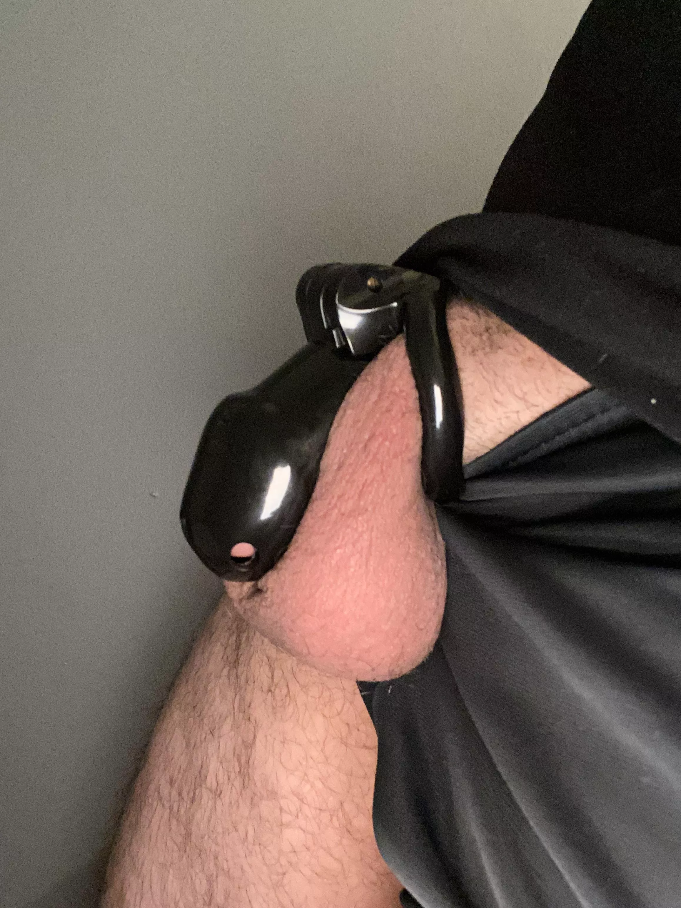 Caged while she’s out on the town holding the key. ;)