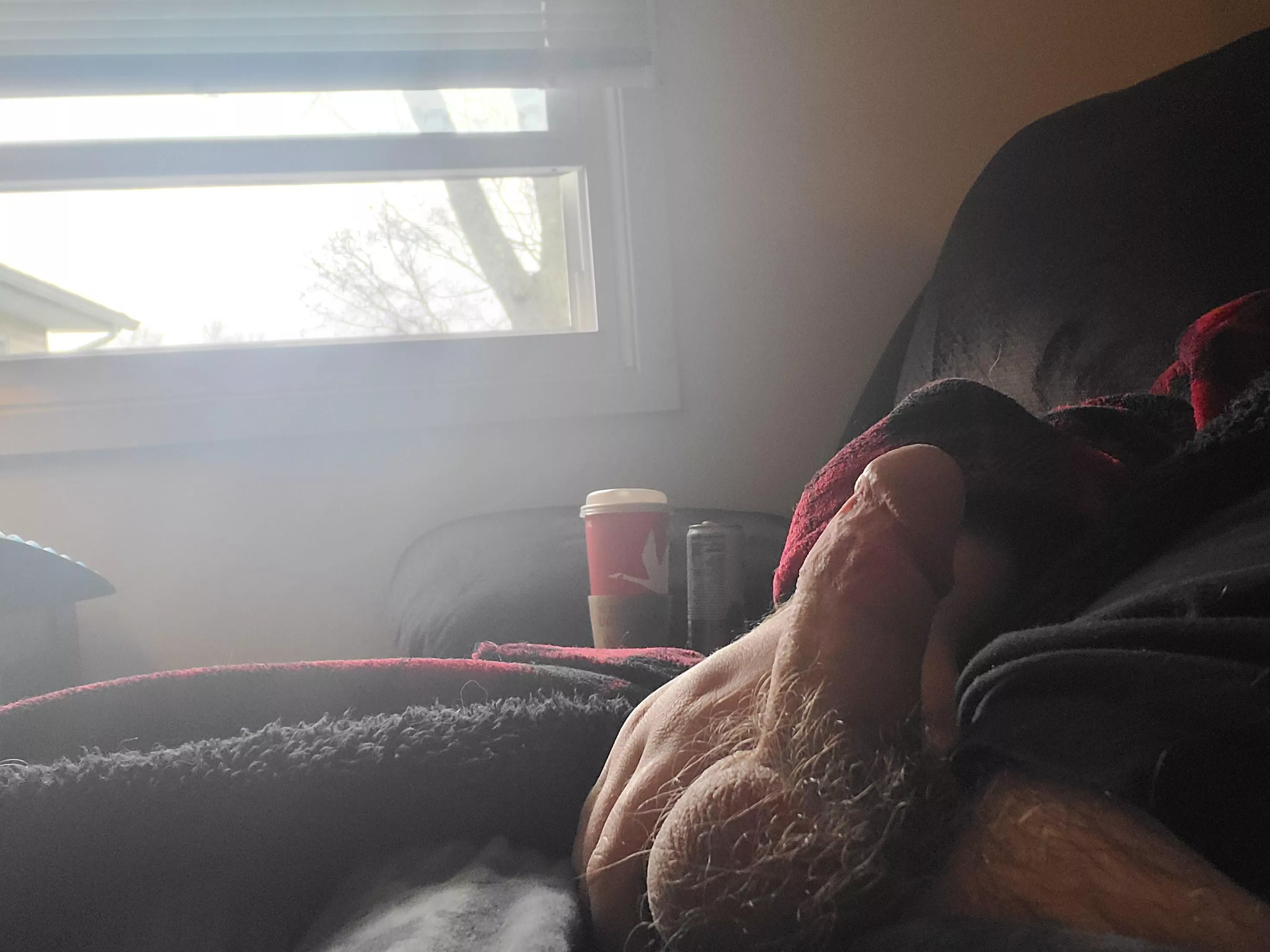 Enjoying a jerk by the window 😈