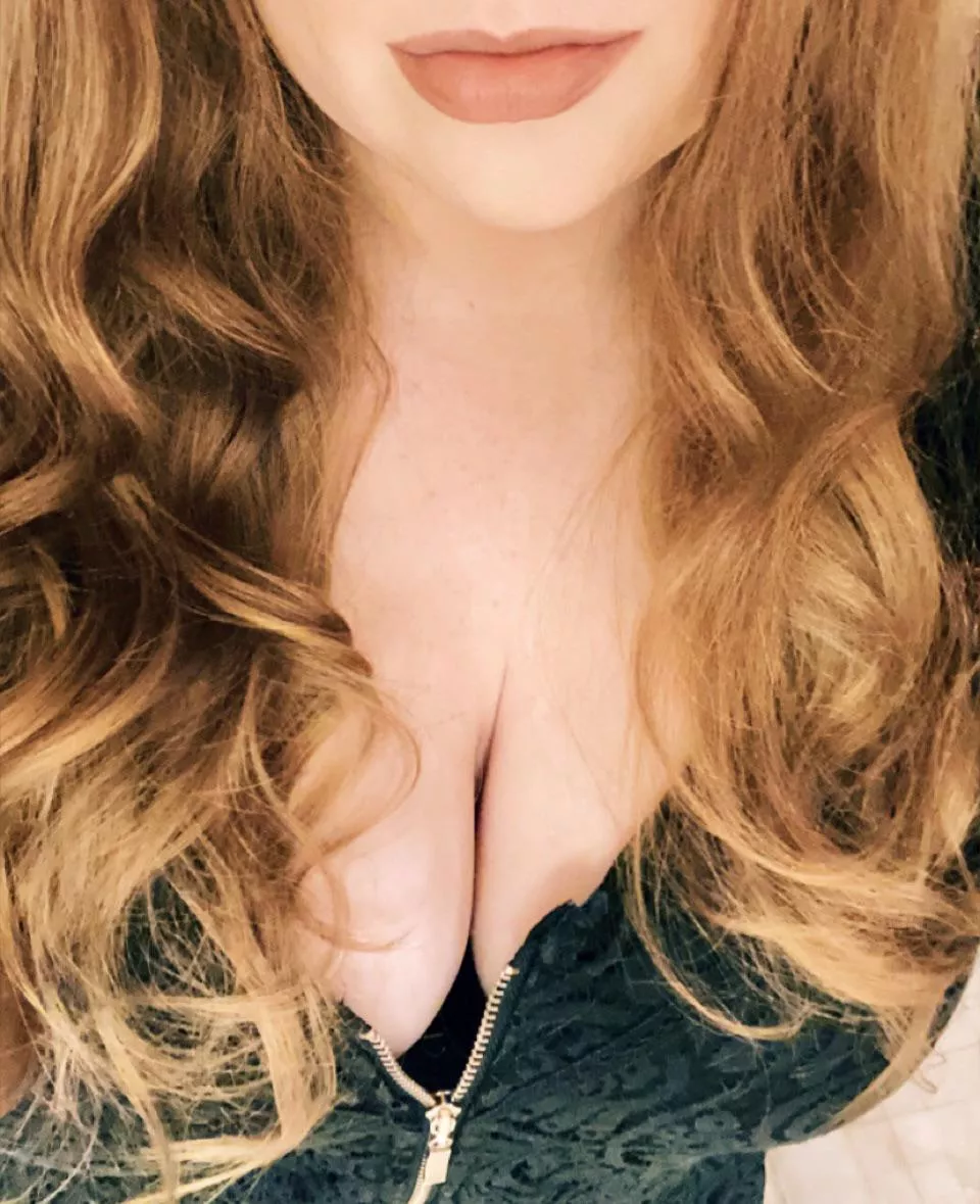 Finally Friday. Cleavage and curls.