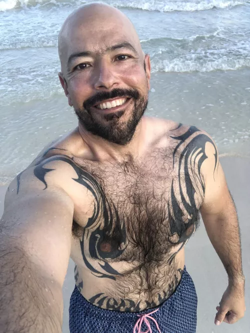 Hairy chest on the beach