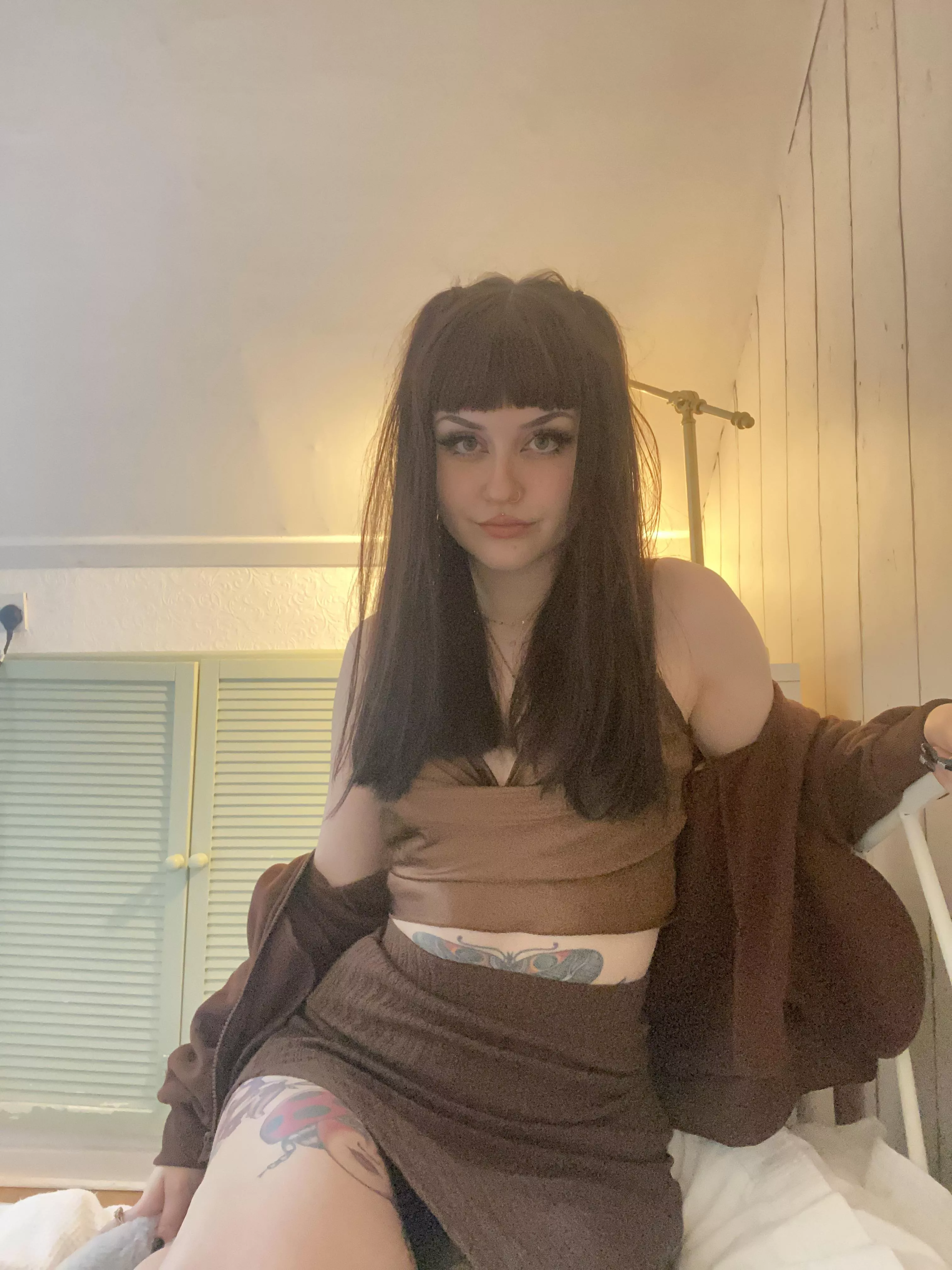 I like the way my stomach tattoo peeks out from my crop top