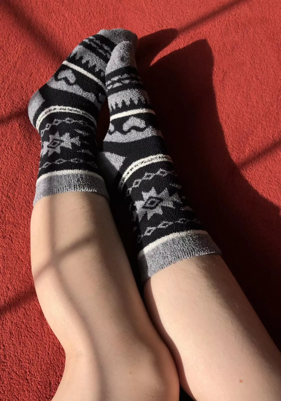 I love the white stripes on these grey and black fuzzy socks. They wrap around the best parts of my feet. 😉 What do you think?
