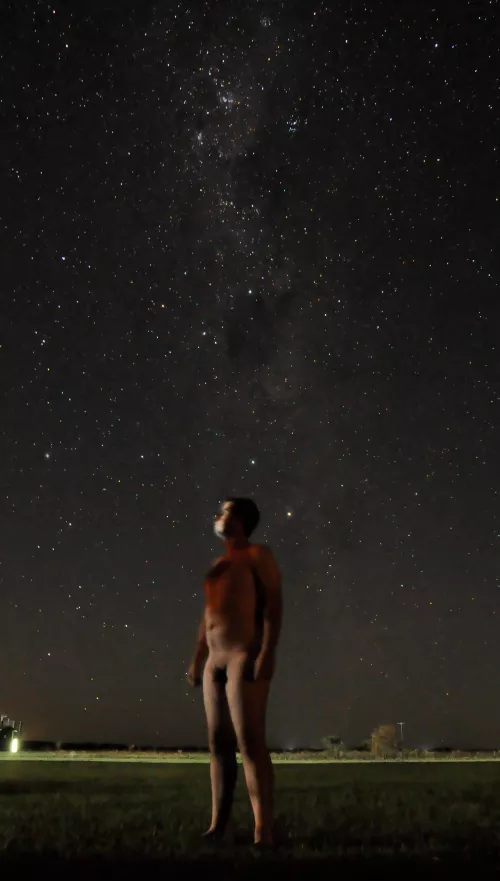 In a contemplative state facing the infinite 💙🌌