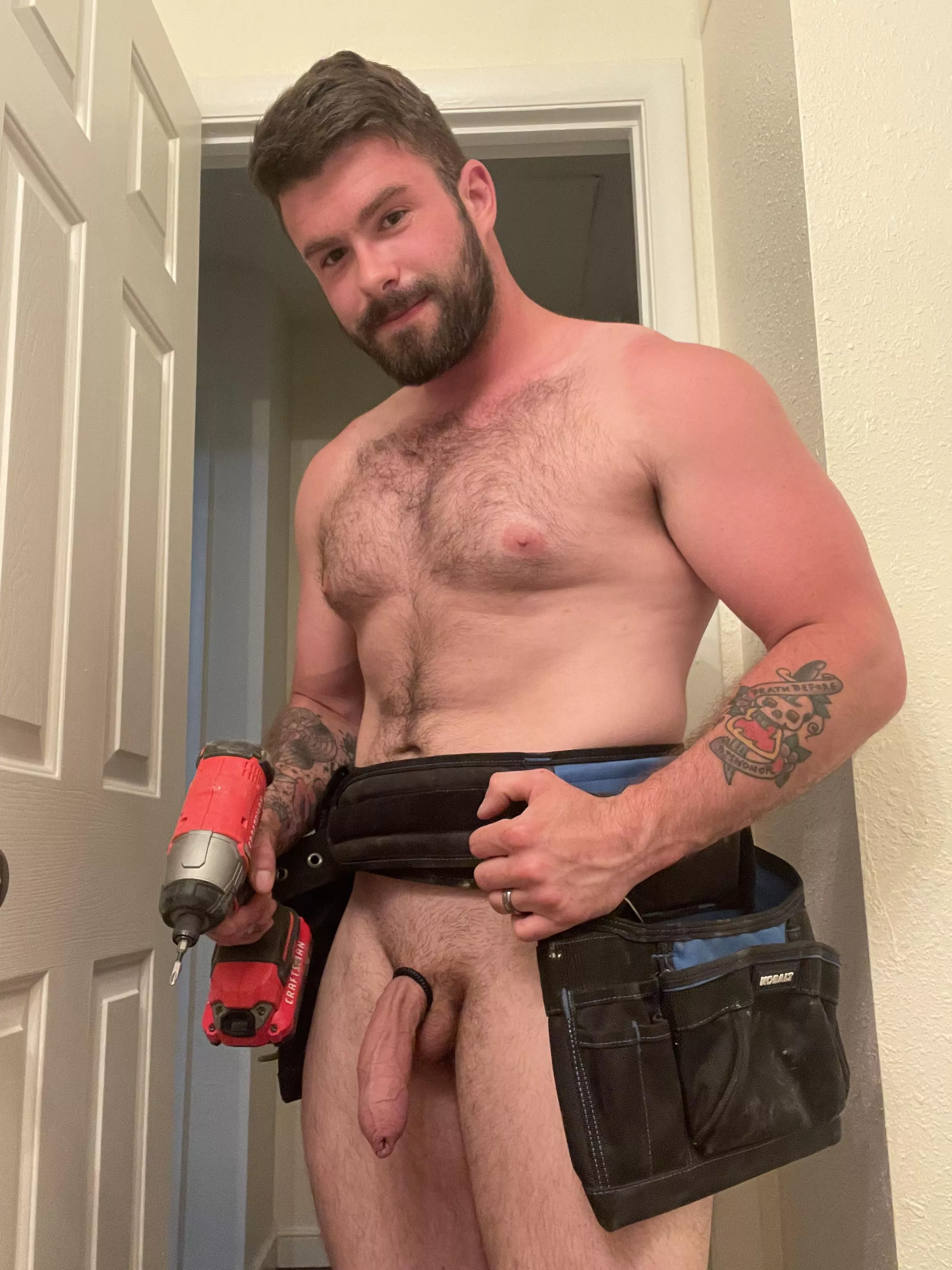 Just a tattood handy man ready to drill some holes