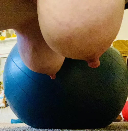 My kitty is rolling around with a medicine ball. I need to get some videos of this!