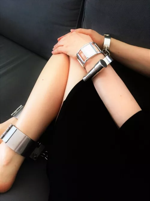 [OC] I have to be chained if I want to watch TV - Darby cuffs and ankle manacles [F]