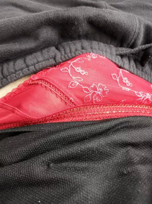 relaxing on the sofa, nice red thong for a Sunday