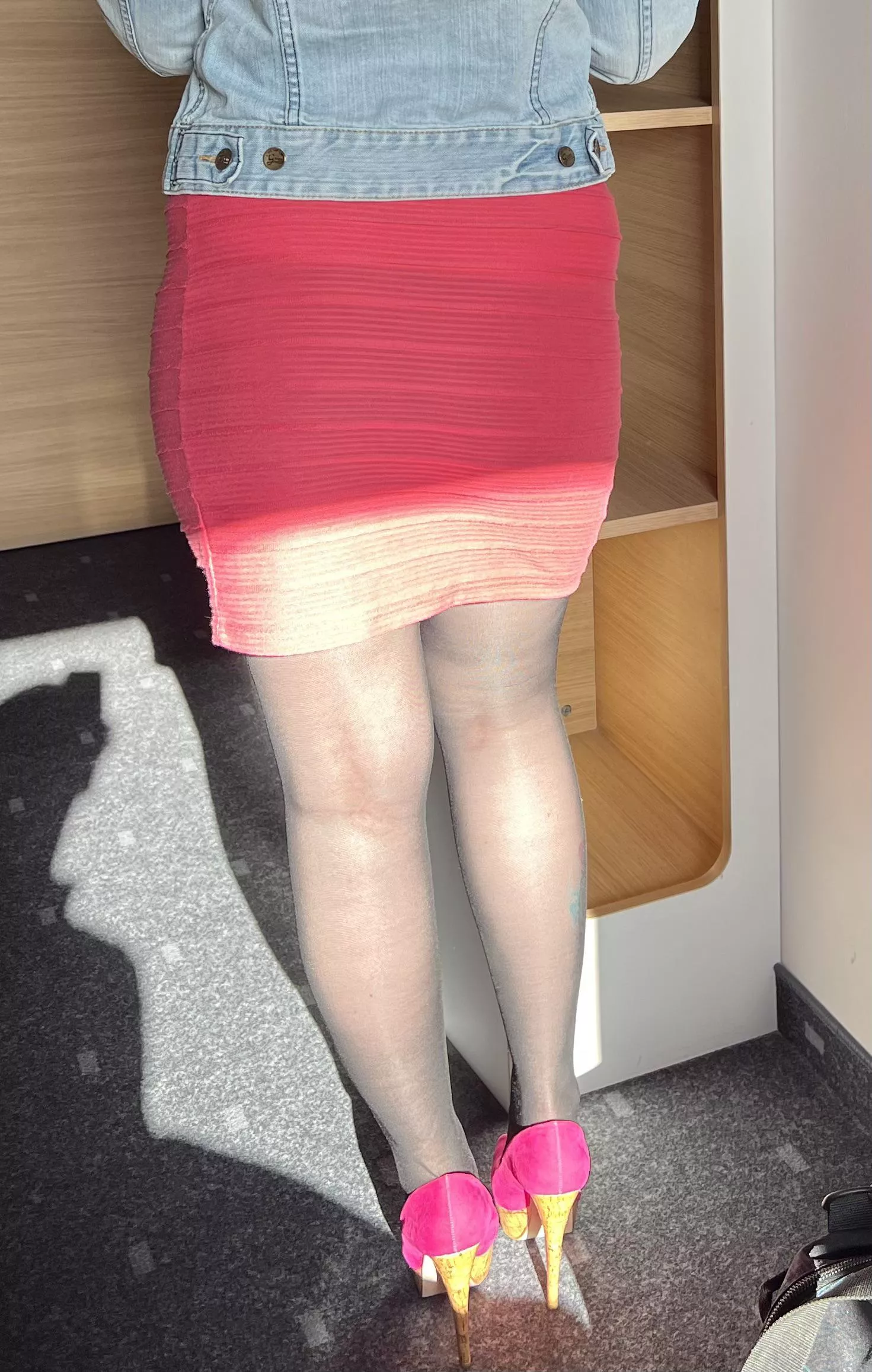 Tight pink skirt and tights