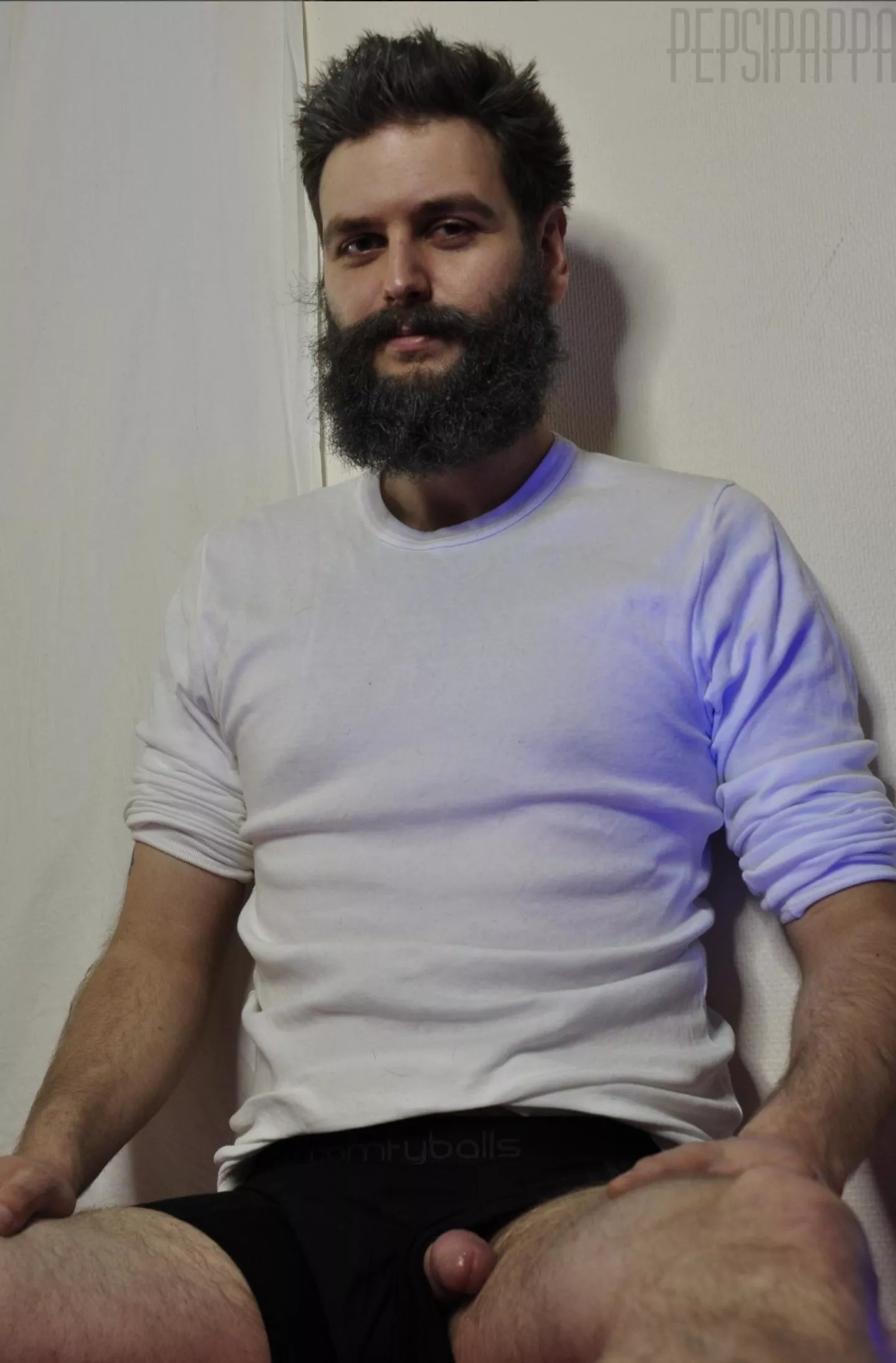 Untrimmed beard and a peeker