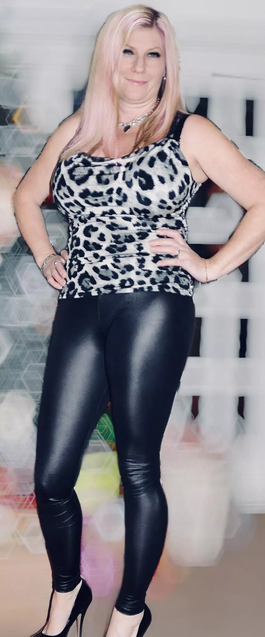 Wife in shiny leggings
