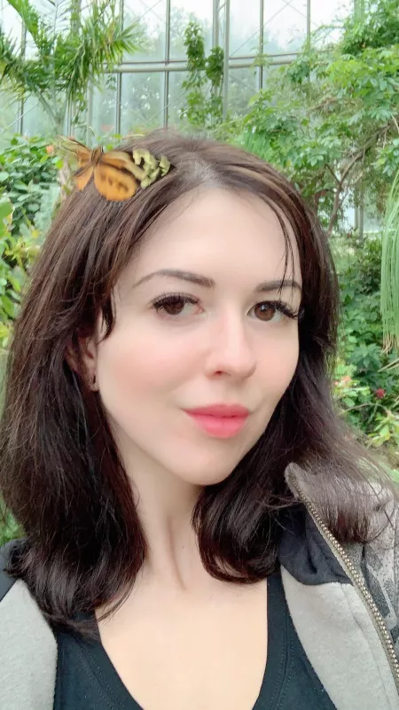 A butterfly landed on my head as I took this selfie at the Houston Museum of Natural Science