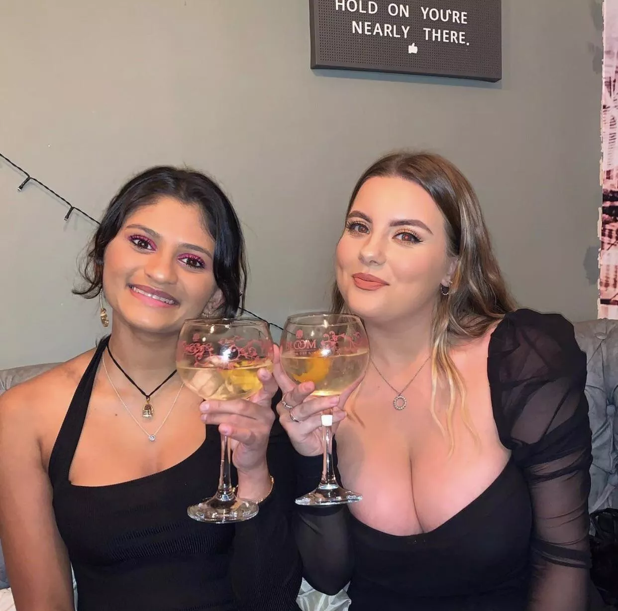 Black dresses, different cleavage