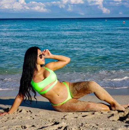 Can someone help me get the sand off of my body? (f)