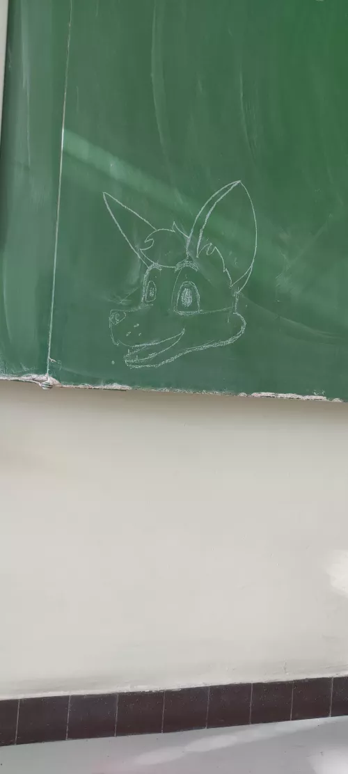 Drew this little doodle on the school board while waiting for my dad to come pick me up