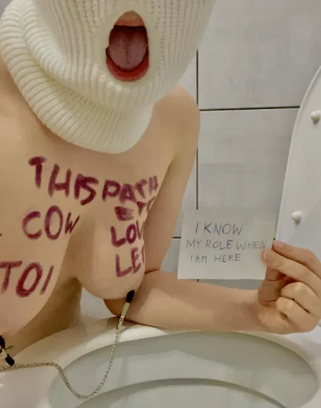 Even if she’s wearing the balaclava my slave is still a worthless whore.