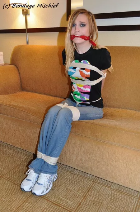 Fully clothed, tightly bound