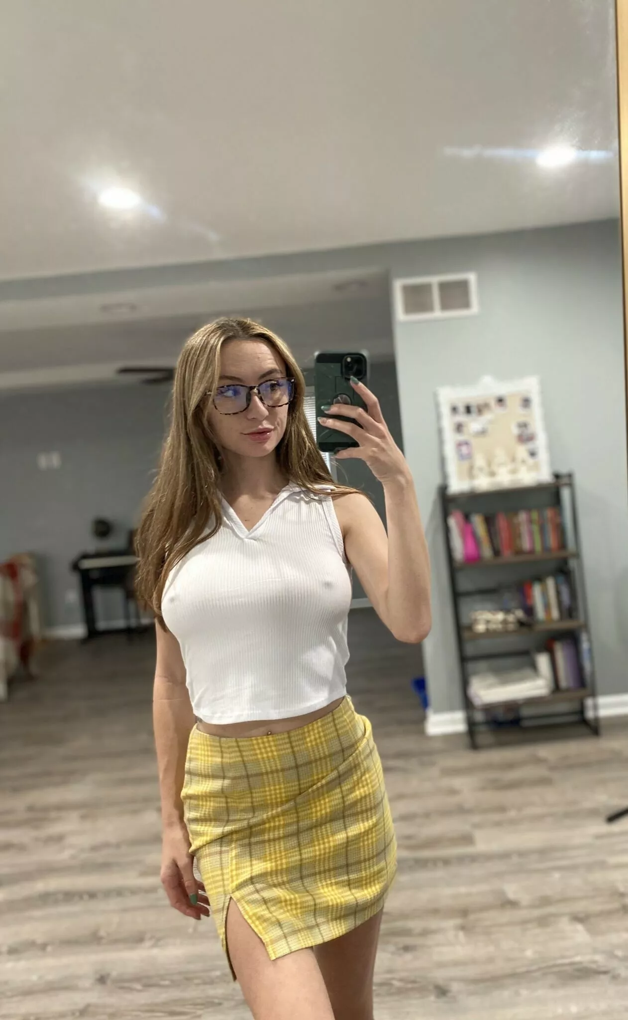 In a plaid miniskirt