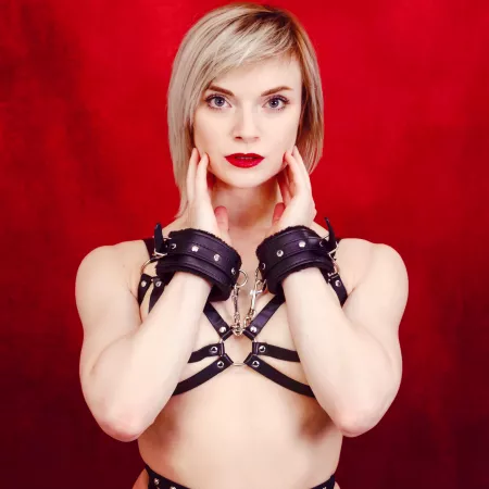 Ladies in leather..cuffs 👹