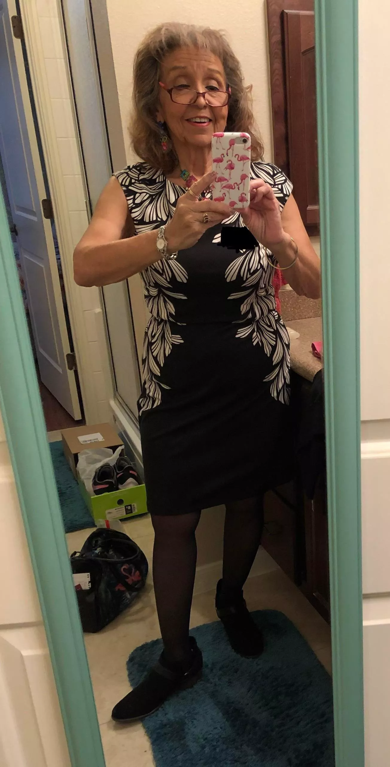 Lil cutie taking a black dress selfie. 5’1 of pure sexy