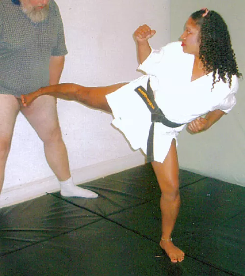 OC A photo from a session I had in 1998. I was lucky enough to find a source for several different women through the famous Asia... good times. Quality is not that great but this woman was a legitimate black belt who trained with Asia and she liked kicki