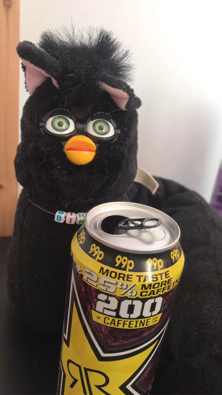One of my favourite plushies is my long furby 🖤