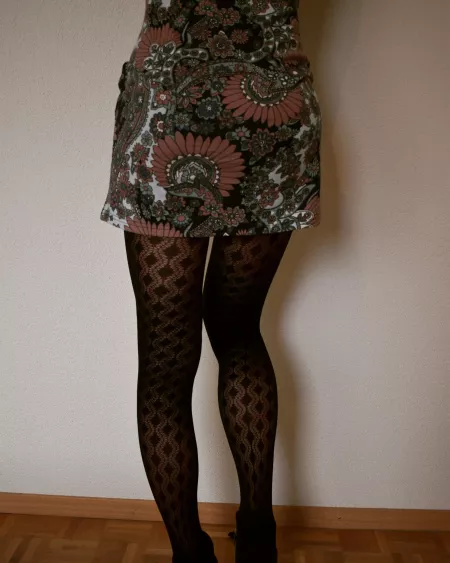 Patterned tights and vintage dress
