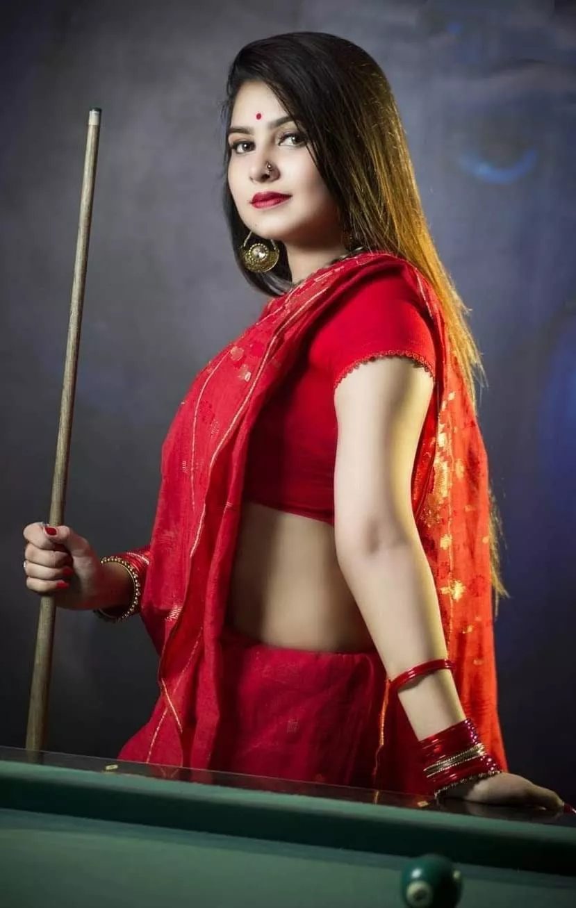 Saree-clad beauty ready for a billiards duel