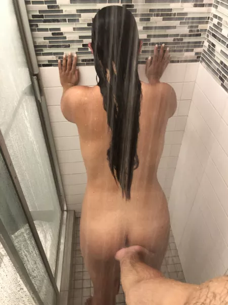 She was just trying to shower... didn’t even turn around