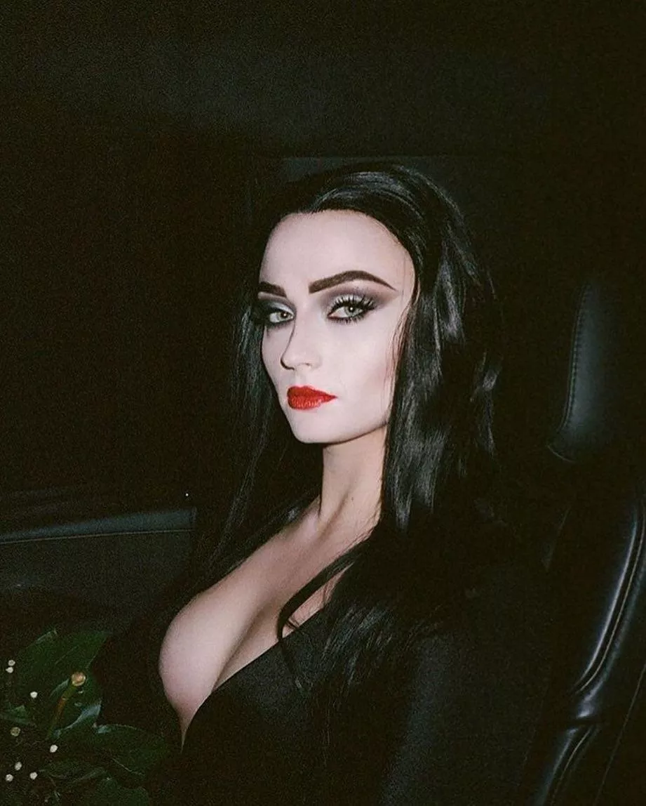 Sophia Turner as Morticia Addams