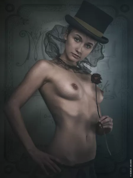 The ring-mistress beckons toward dark delights