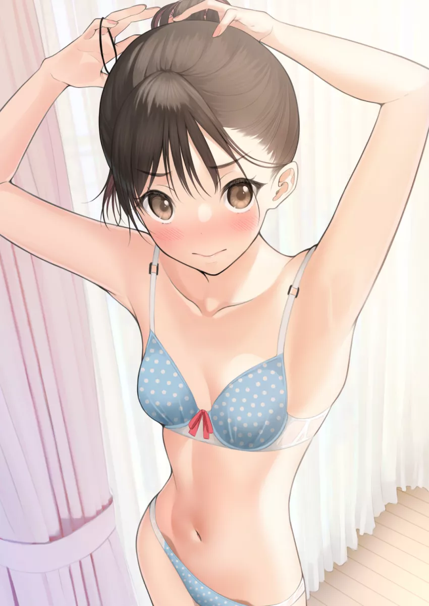 Tying her hair up