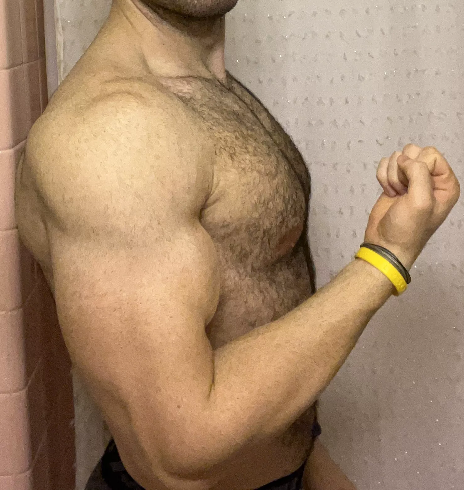 What catches your attention first? Chest hair or bicep?