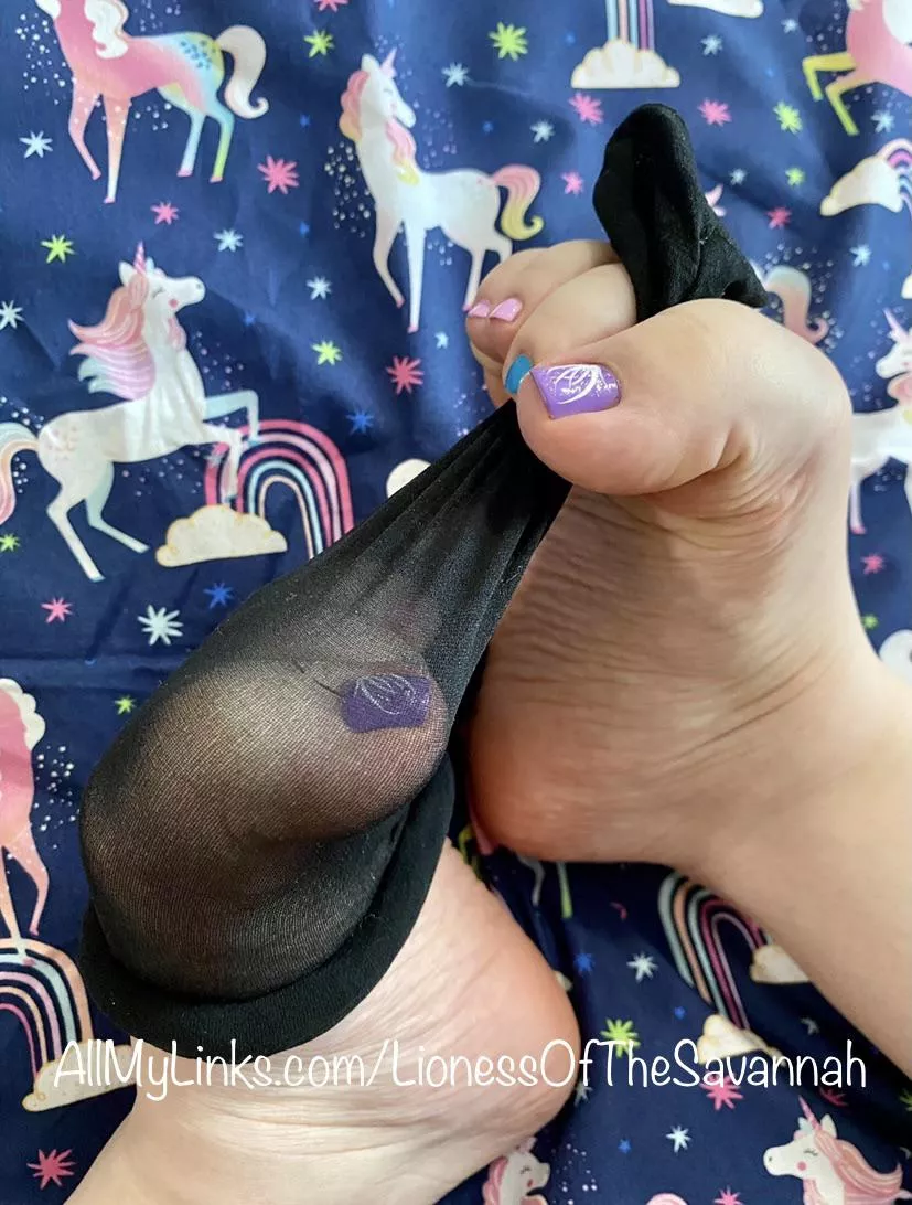 Who likes my playful freshly done multicolored toes pulling off my stocking?! 😜